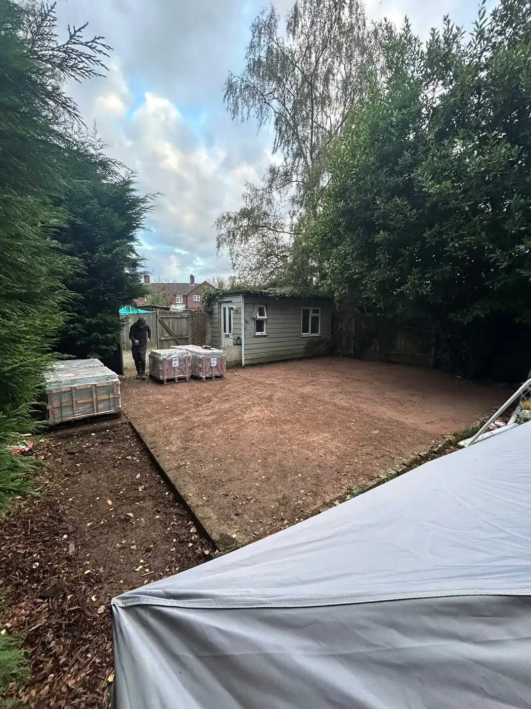 Compacted patio sub-base ready for the laying bed