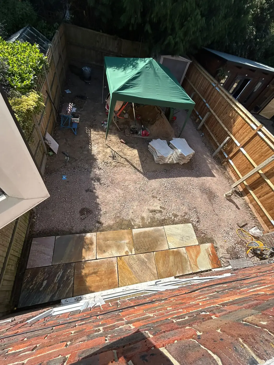 First Fossil Buff sandstone slabs laid during the Rhys Graves project