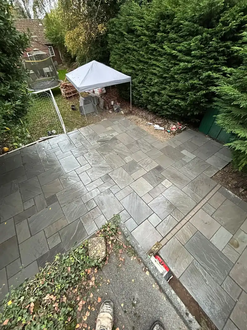 Large grey sandstone patio with clean joint lines