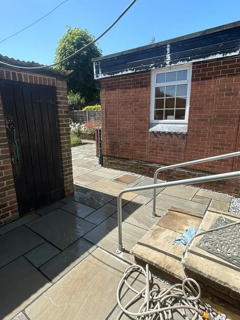 Accessible sandstone path with a metal handrail